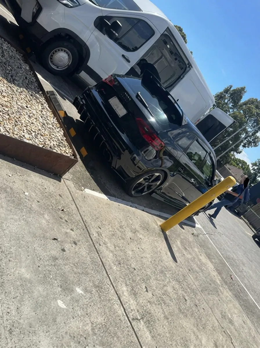Black vehicle on delivery truck financed through JLP Financial Services